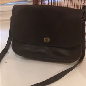 Chocolate brown vintage crossbody coach.